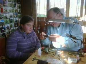 Hilary tying her first fly with Paul Little on a ladies day