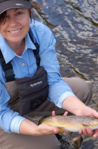 Anne Woodcock Ladies Fishing with a Brown Trout she caught on the Fly
